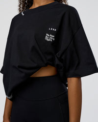 Woman wearing Sticker Heavyweight Oversized Tee - Black-White | Model:Jordan | Size:XS | Thumbnail Index: 11