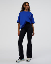 Woman wearing Sticker Heavyweight Oversized Tee - Electric Indigo-Baltic Sea | Model:Jordan | Size:XS | Thumbnail Index: 12