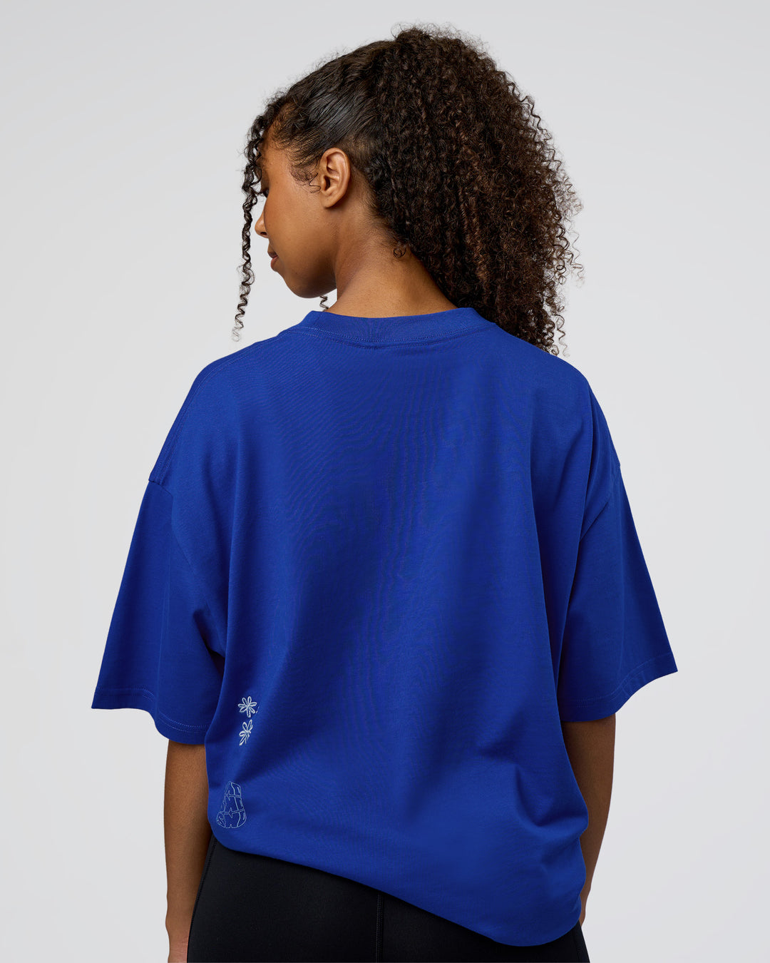 Woman wearing Sticker Heavyweight Oversized Tee - Electric Indigo-Baltic Sea | Model:Jordan | Size:XS - view 5