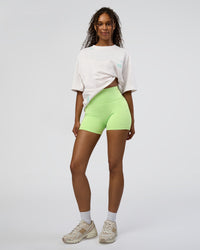 Woman wearing Sticker Heavyweight Oversized Tee - Off White-Jelly Mint | Model:Jordan | Size:XS | Thumbnail Index: 8