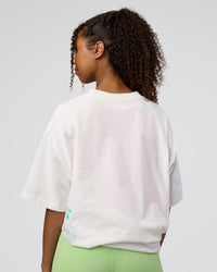 Woman wearing Sticker Heavyweight Oversized Tee - Off White-Jelly Mint | Model:Jordan | Size:XS | Thumbnail Index: 10