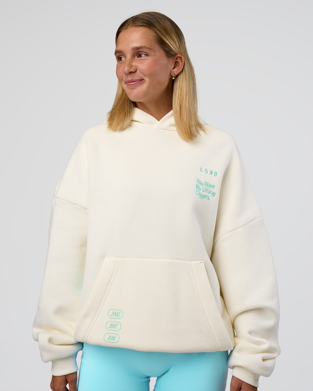 Woman wearing Sticker Unisex Oversized Hoodie - Off White-Jelly Mint | Model:Amity | Size:XS - view 4