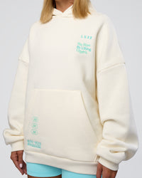 Woman wearing Sticker Unisex Oversized Hoodie - Off White-Jelly Mint | Model:Amity | Size:XS | Thumbnail Index: 13