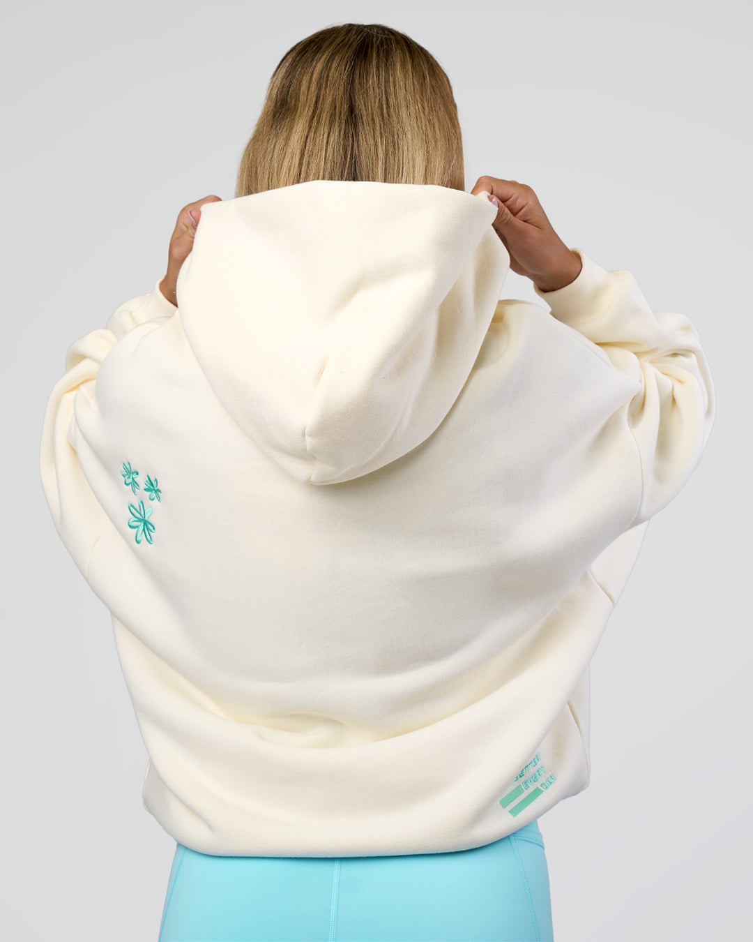 Woman wearing Sticker Unisex Oversized Hoodie - Off White-Jelly Mint | Model:Amity | Size:XS - view 9