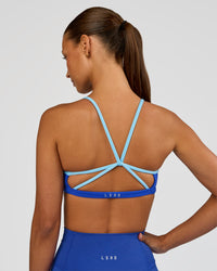 Woman wearing Tempo Sports Bra - Electric Indigo-Baltic Sea | Model:Brylee | Size:XS | Thumbnail Index: 5