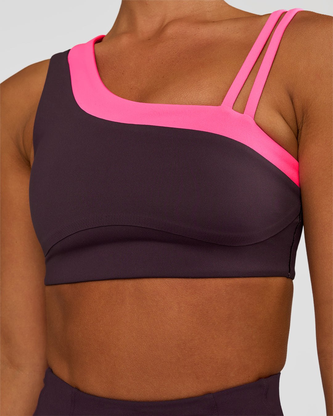 Woman wearing Thrive Asymmetric Sports Bra - Midnight Plum-Sugar Plum | Model:Brylee | Size:XS - view 6