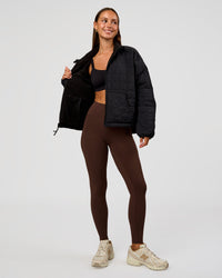 Woman wearing Thrive Reversible Jacket - Black | Model:Brylee | Size:XS | Thumbnail Index: 10