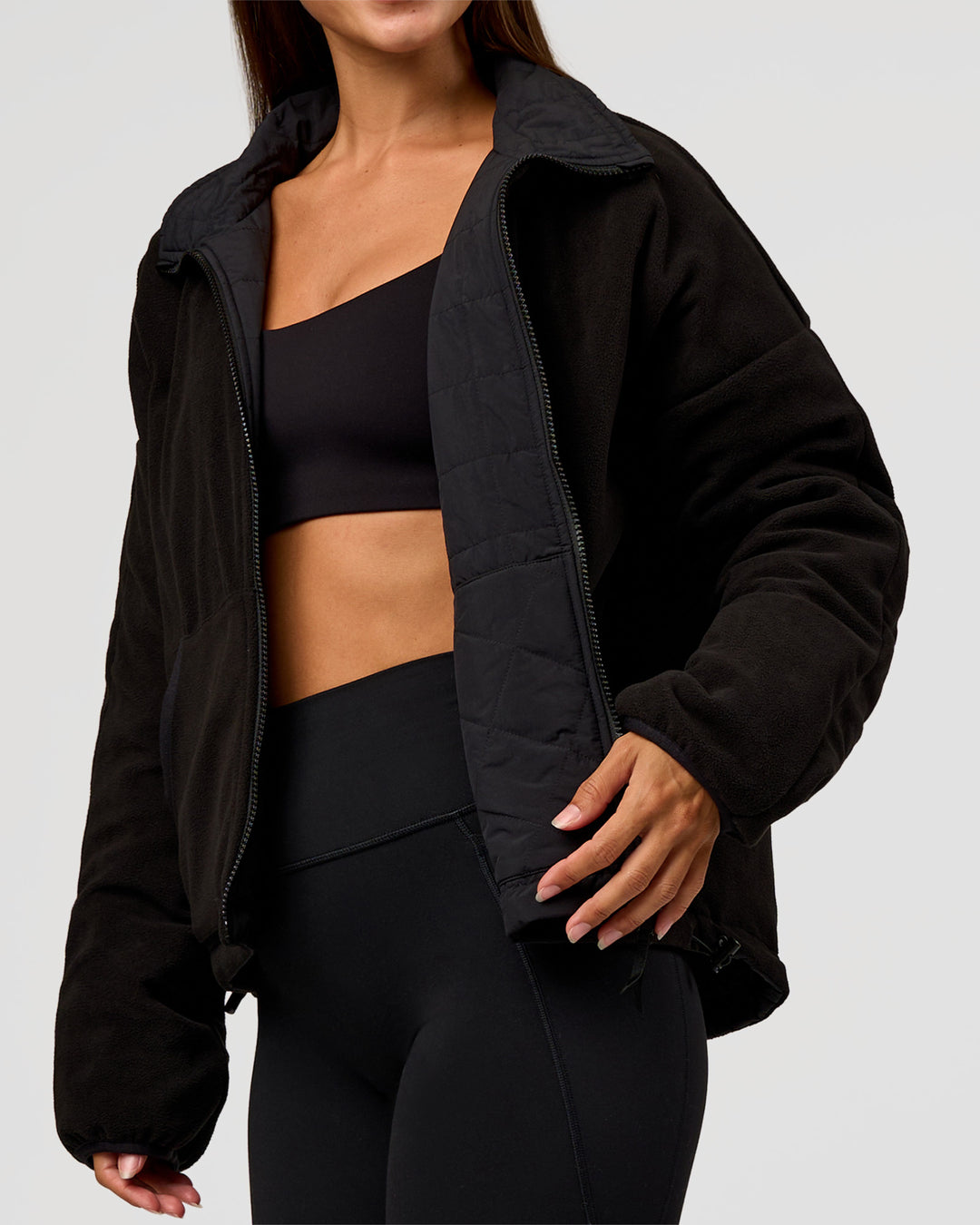 Woman wearing Thrive Reversible Jacket - Black | Model:Brylee | Size:XS - view 14