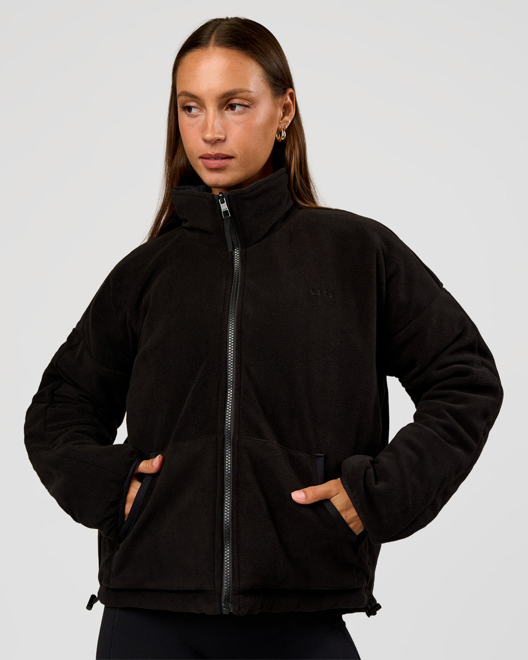 Woman wearing Thrive Reversible Jacket - Black | Model:Brylee | Size:XS - view 6