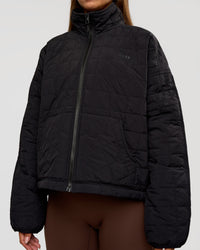 Woman wearing Thrive Reversible Jacket - Black | Model:Brylee | Size:XS | Thumbnail Index: 12