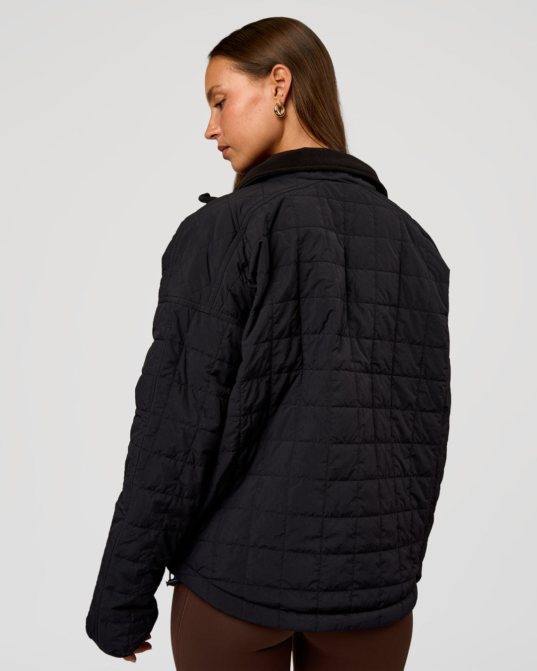 Woman wearing Thrive Reversible Jacket - Black | Model:Brylee | Size:XS - view 4