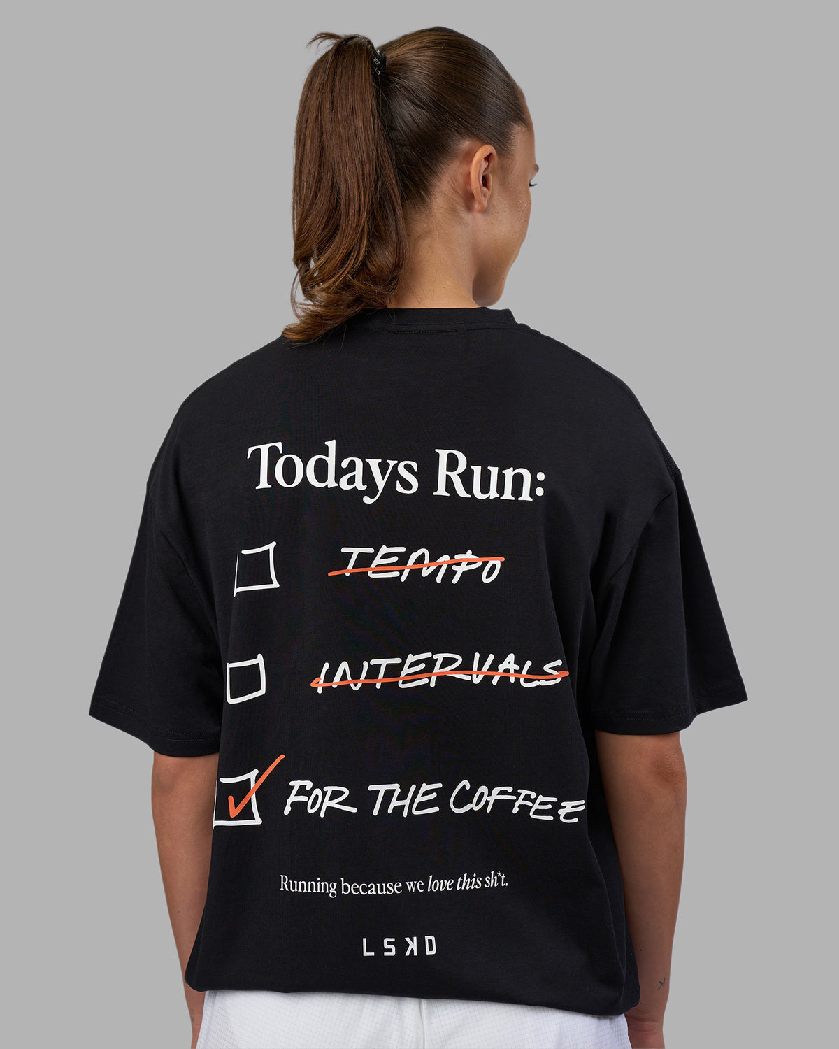 Woman wearing Today's Run FLXCotton Oversized Tee - Black-White | Model:Charlize | Size:XS
