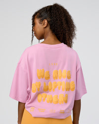 Woman wearing Together We Rise FLXCotton Oversized Tee - Bubblegum-Warm Apricot | Model:Jordan | Size:L | Thumbnail Index: 3