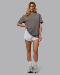Woman wearing Trust The Process 2.0 FLXCotton Tee Oversize - Storm Front-Shale Beige | Model:Emilie | Size:XS | Thumbnail Index: 4