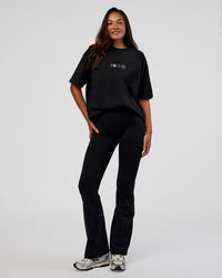 Woman wearing Trust The Process Heavyweight Unisex Oversized Tee - Black-White | Model:Kirstyn | Size:XS | Thumbnail Index: 6