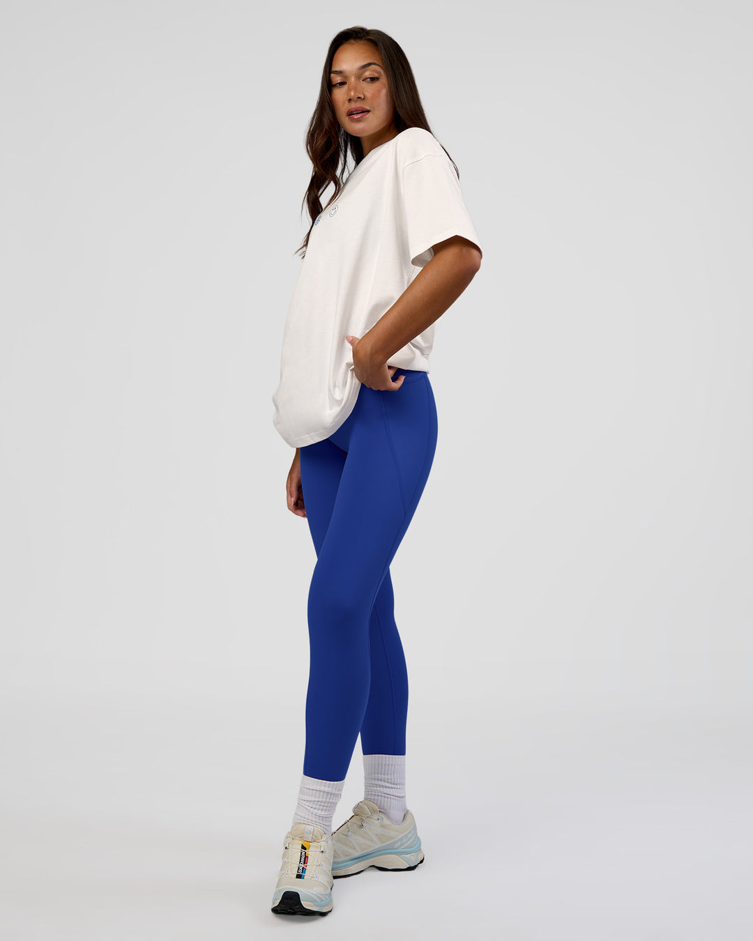 Woman wearing Trust The Process Heavyweight Unisex Oversized Tee - Off White-Electric Indigo | Model:Kirstyn | Size:XS - view 10