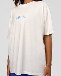Woman wearing Trust The Process Heavyweight Unisex Oversized Tee - Off White-Electric Indigo | Model:Kirstyn | Size:XS | Thumbnail Index: 10
