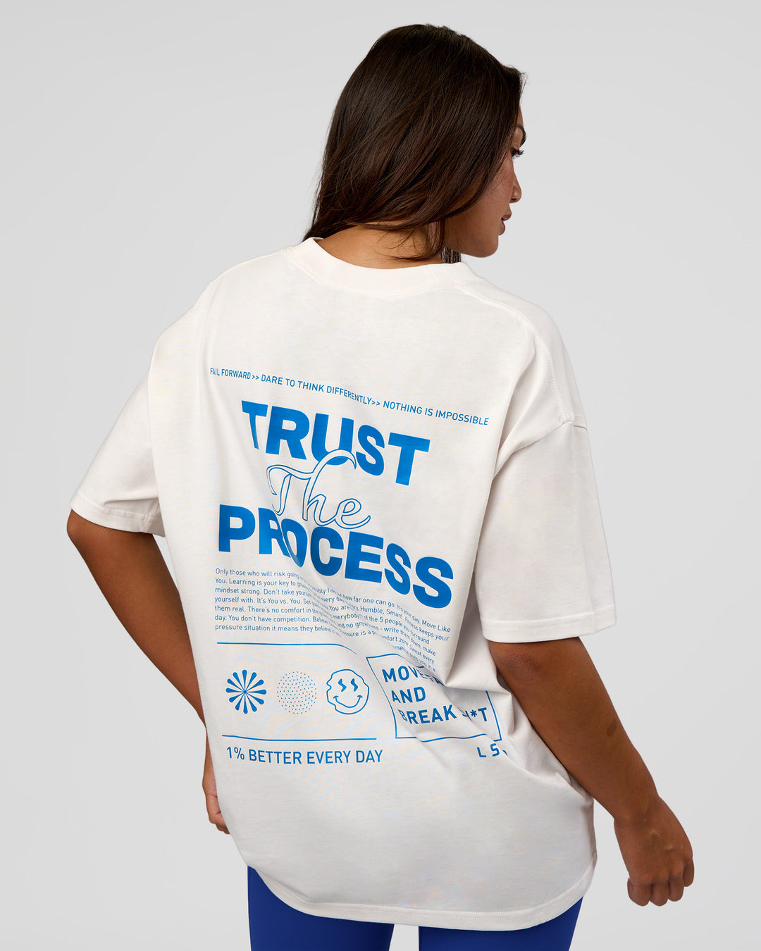 Woman wearing Trust The Process Heavyweight Unisex Oversized Tee - Off White-Electric Indigo | Model:Kirstyn | Size:XS - view 4