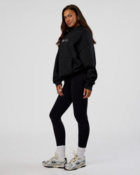 Woman wearing Trust The Process Unisex Oversized Hoodie - Black-White | Model:Kirstyn | Size:XS | Thumbnail Index: 11
