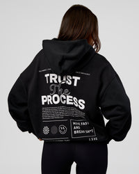 Woman wearing Trust The Process Unisex Oversized Hoodie - Black-White | Model:Kirstyn | Size:XS | Thumbnail Index: 3