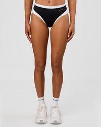 Woman wearing Turbo Track Brief in Black-White| Model:Txai | Size:XS | Thumbnail Index: 4