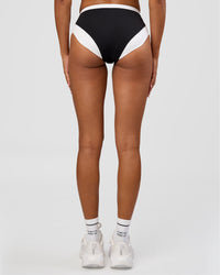 Woman wearing Turbo Track Brief in Black-White| Model:Txai | Size:XS | Thumbnail Index: 0