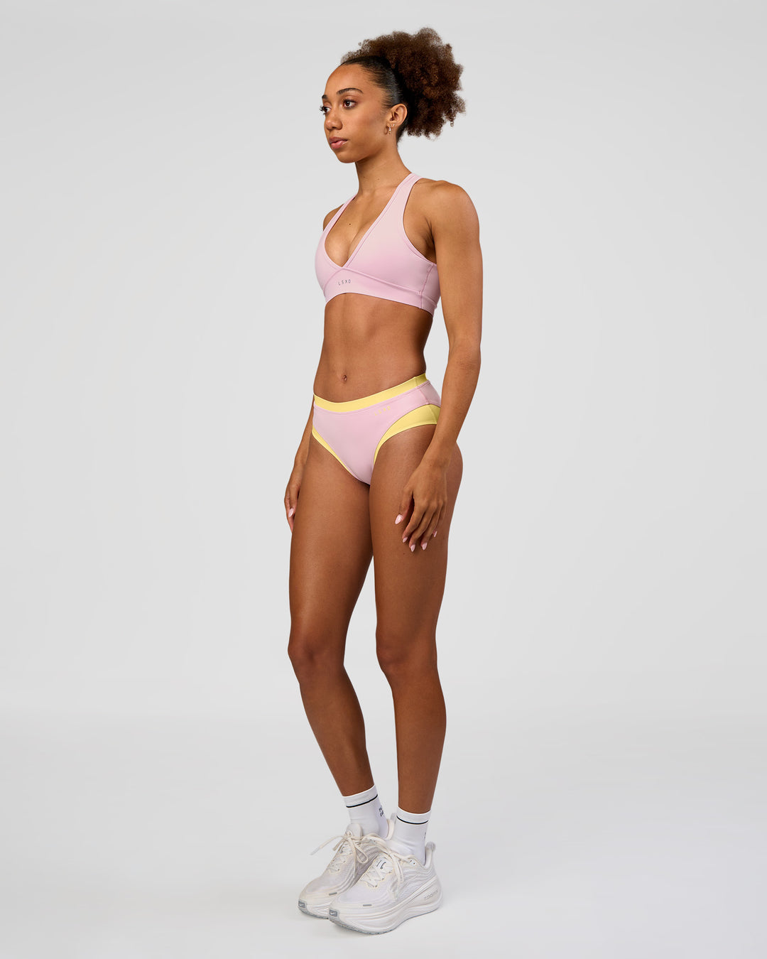 Woman wearing Turbo Track Brief in Marshmallow-Lemon | Model:Txai | Size:XS - view 5