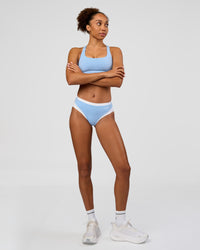 Woman wearing Turbo Track Brief in Open Air-White | Model:Txai | Size:XS | Thumbnail Index: 3