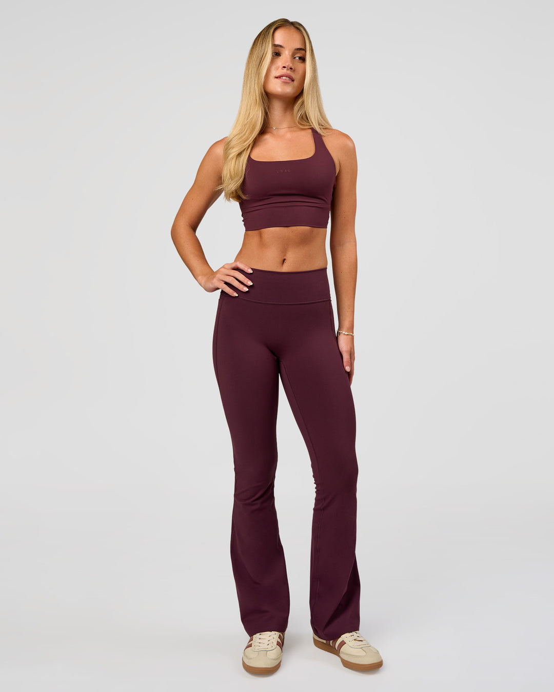 Woman wearing Twist Long Line Sports Bra in Cherry Lacquer | Model:Issy | Size:XS - view 3