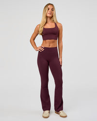 Woman wearing Twist Long Line Sports Bra in Cherry Lacquer | Model:Issy | Size:XS | Thumbnail Index: 2