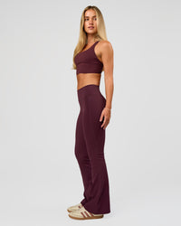 Woman wearing Twist Long Line Sports Bra in Cherry Lacquer | Model:Issy | Size:XS | Thumbnail Index: 4