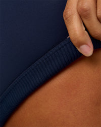 Woman wearing Twist Sports Bra D/DD/E - Future Navy | Model:Brylee | Size:XS | Thumbnail Index: 9