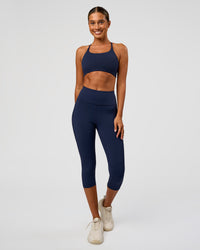 Woman wearing Twist Sports Bra - Future Navy | Model:Charli | Size:XS | Thumbnail Index: 3