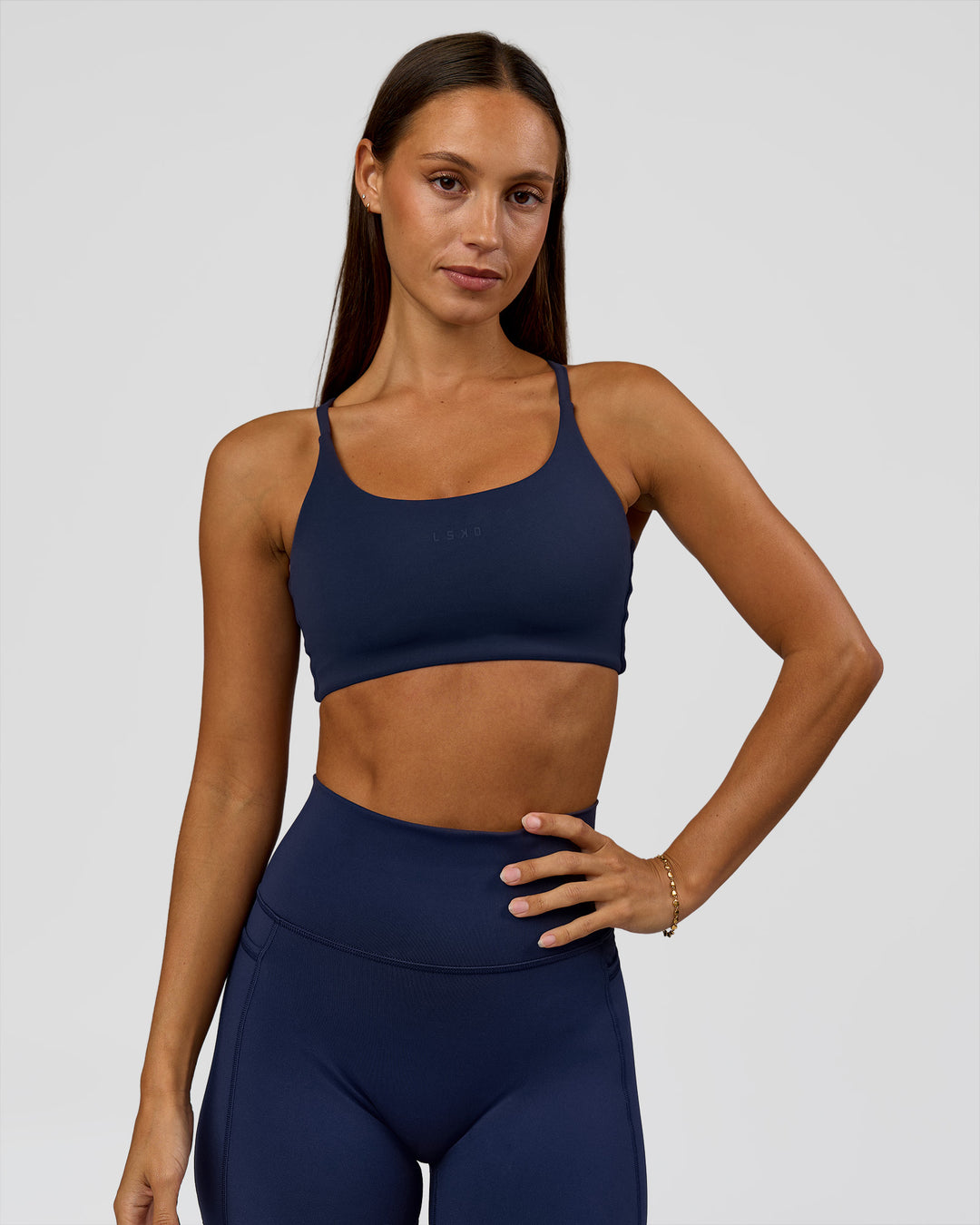 Woman wearing Twist Sports Bra - Future Navy | Model:Brylee | Size:XS - view 8