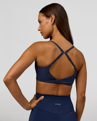 Woman wearing Twist Sports Bra - Future Navy | Model:Brylee | Size:XS | Thumbnail Index: 9