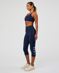 Woman wearing Twist Sports Bra - Future Navy | Model:Charli | Size:XS | Thumbnail Index: 4