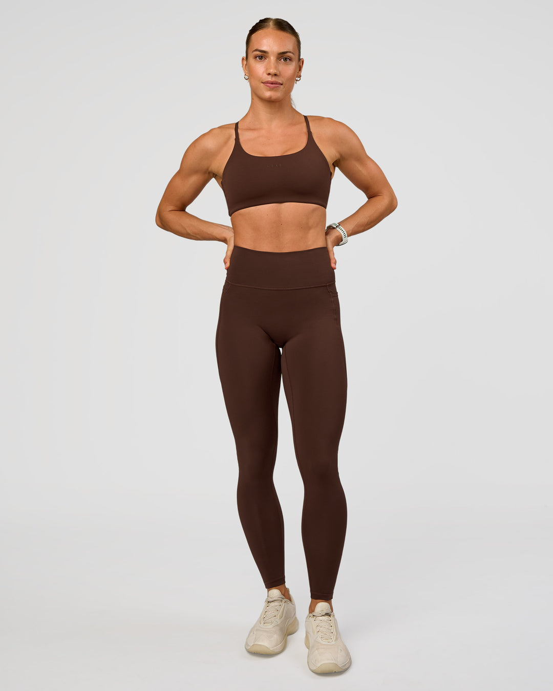 Woman wearing Twist Sports Bra - Hot Chocolate | Model:Maja | Size:XS - view 6