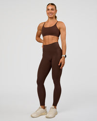 Woman wearing Twist Sports Bra - Hot Chocolate | Model:Maja | Size:XS | Thumbnail Index: 6