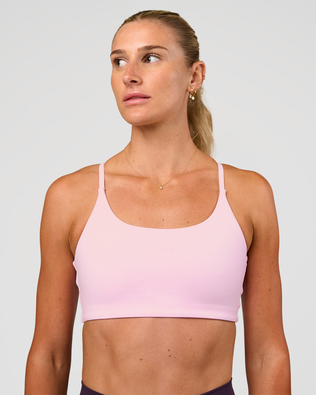 Woman wearing Twist Sports Bra - Marshmallow | Model:Emelia | Size:XS - view 1