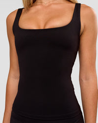 Woman wearing Twist Square Neck Shelf Bra Tank in Black | Model:Issy | Size:XS | Thumbnail Index: 7
