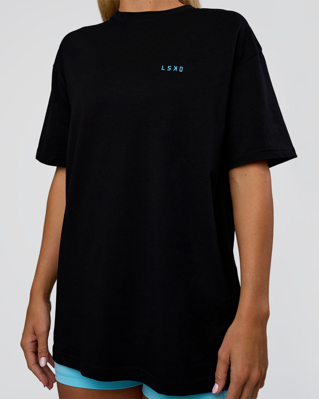 Woman wearing Unfit Club FLXCotton Oversized Tee - Black-White | Model:Amity | Size:XS - view 9