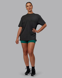 Woman wearing Unisex 1% Better FLXCotton Tee Oversize - Pirate Black-Black | Thumbnail Index: 10