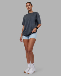 Woman wearing Lifting Club FLXCotton Tee Oversize - Dark Storm Washed-Blue | Model:Rhiley | Size:XS | Thumbnail Index: 10