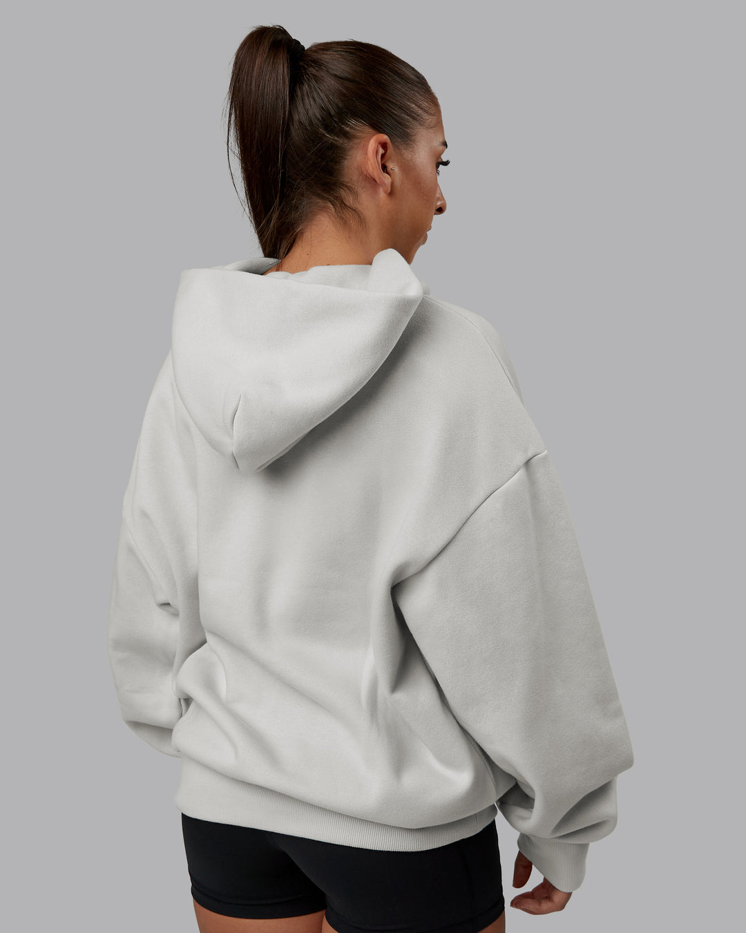 Woman wearing MVP Oversized Hoodie - Digital Mist | Model:Tylah | Size:XS - view 8