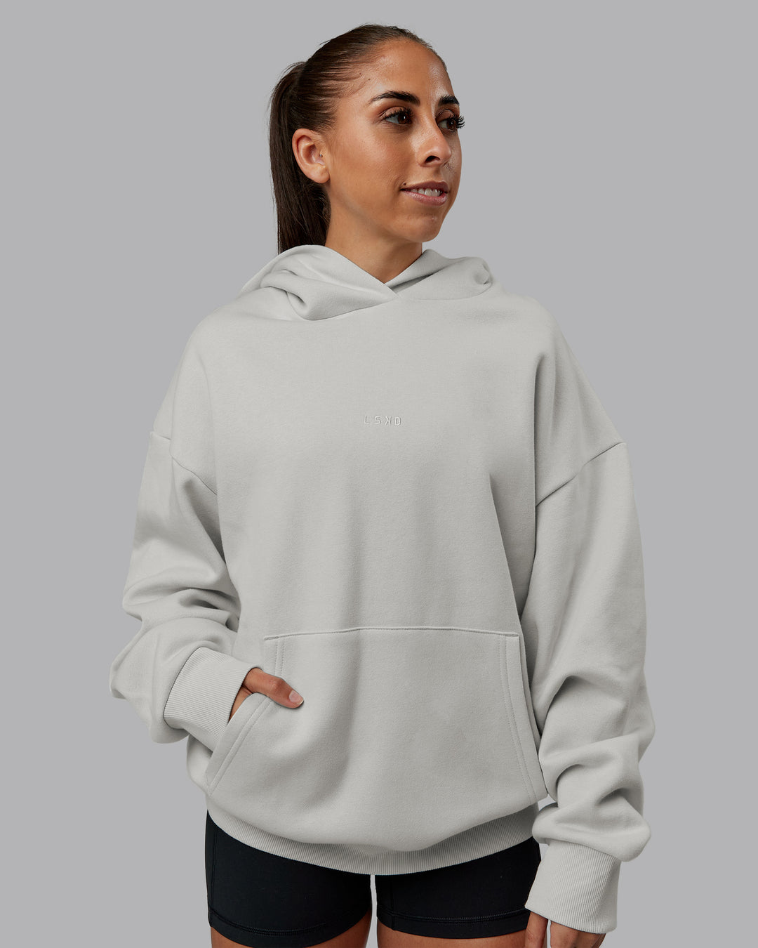 Woman wearing MVP Oversized Hoodie - Digital Mist | Model:Tylah | Size:XS - view 3