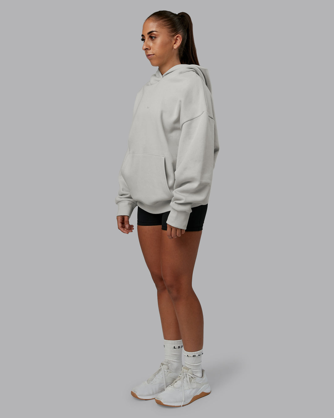 Woman wearing MVP Oversized Hoodie - Digital Mist | Model:Tylah | Size:XS - view 10