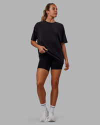 Woman wearing Unisex Washed Pressure Heavyweight Tee Oversize - Black-White | Thumbnail Index: 10