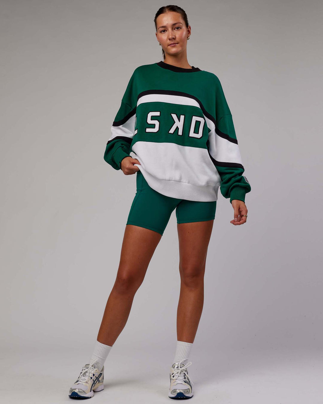 Woman wearing Unisex PrimeTime Sweater Oversize - Malachite-White - view 10