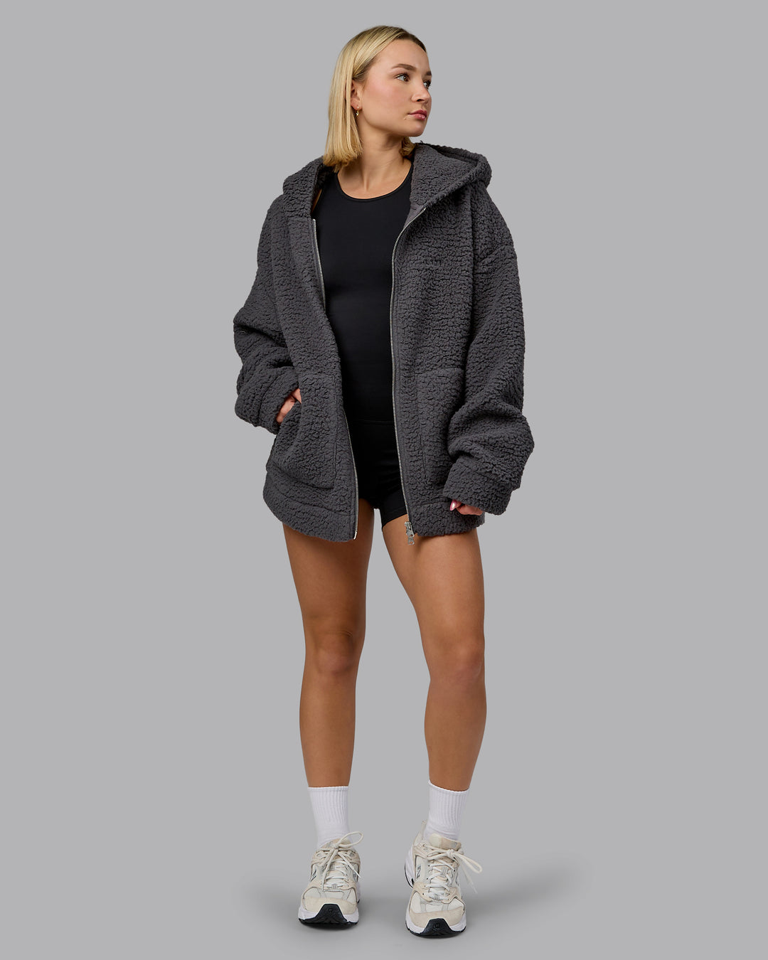 Woman wearing Sherpa Oversized Jacket - Dark Storm | Model:Halle | Size:XS - view 10