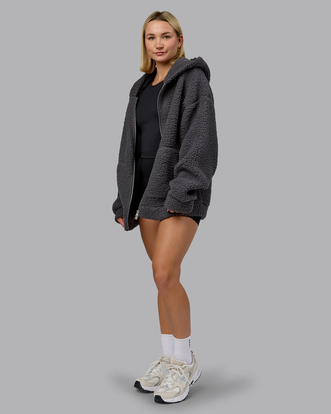 Woman wearing Sherpa Oversized Jacket - Dark Storm | Model:Halle | Size:XS - view 5